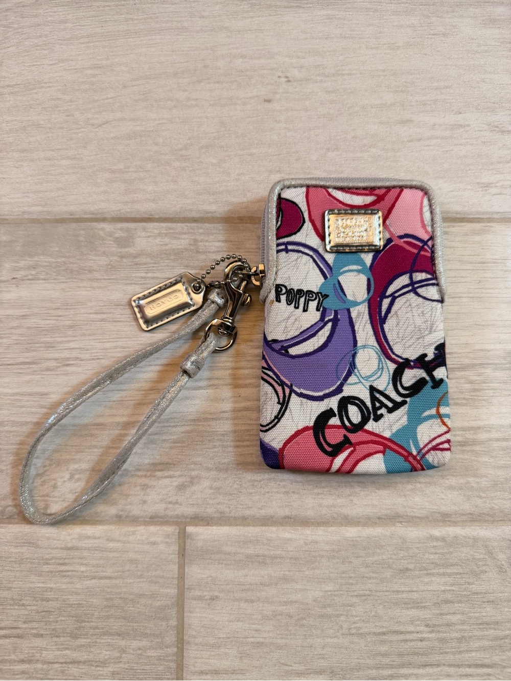 Coach Multicolor Poppy Wristlet Phone Case in Pink Purple Blue